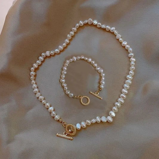 Elegante Perlenhalskette und Perlenarmkette – Ansicht 1